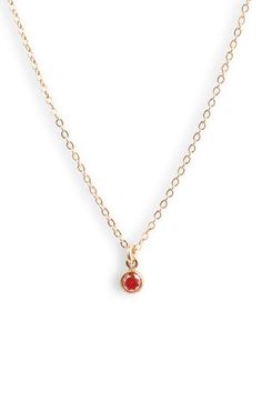 A mini pendant necklace offers sweet sparkle with a birthstone-inspired cubic zirconia charm in the color of your choice. 16" length 14k-gold fill/cubic zirconia Made in the USA Minimalist Red Birthstone Necklace, Red 14k Gold Birthstone Necklace, Minimalist Red Gemstone Birthstone Necklace, Gold Ruby Pendant Birthstone Necklace, Dainty 14k Gold-filled Birthstone Charm Necklace, Charm Pendant Necklace, Birthstone Charms, Mini Pendant, Charm Pendant