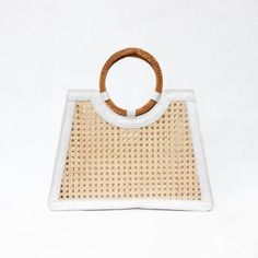 From the beach to shopping and everything in between, Malibu is a hand-held, hand-woven cane bag that'll make the perfect statement to all of your looks. You can use this bag as a nice, large beach tote or even a shopping bag for quick errands! Grab and go and store everything you need while also staying stylish. It's woven cane and leather trim detailing makes this practical bag chic! Dress it up, dress it down and wear it all summer long! The bag also comes with a removable drawstring interior Bamboo Bag, Practical Bag, Wedding Purse, Favorite Daughter, Woman Bags Handbags, Platform Slippers, Kids Sandals, Designer Clothes For Men, Beach Tote