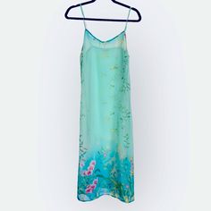 Never Worn Vintage From Late 90s/Early 00s Adjustable Straps Bought In Rome Pit To Pit 32" Length About 48" Questions? Leave A Comment Below! Green Sleeveless Summer Nightgown, Green Summer Nightgown, Blue Sleeveless Vacation Nightgown, Sleeveless Blue Nightgown For Vacation, Blue Spring Vacation Nightgown, Green Floral Print Sleepwear For Summer, Casual Blue Nightgown For Spring, Spring Casual Slip Dress For Sleep, Casual Slip Dress For Sleep Spring Season