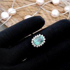 "PRODUCT DETAILS: ★ Completely Natural Gems Comes With \"Lab Certification\" ★ Natural Columbian Emerald : 3.10 CARAT.    \"Weight Can Vary\" ★ CUT: OVALCUT 7X10MM ★ Material: 18K White Gold  \"Customisation can be done In 14K\" ★ Gross Weight: 4 GRAMS    \"Weight Can Vary\" ★ 18K Gold Weight: 3.30 GRAMS ★ Natural Diamond Weight: 0.55 CARAT.     \"Weight Can Vary\" ★ Natural Diamond Colour/Clarity: G-H/VS1 ROUND BRILLIANT CUT ★ READY TO SHIP IN 7-10 BUSINESS DAYS ★ All Jewellery will Be Authentic  \"Lab Certified\". ★ All Product Images Are Real-Time Images, Our Policy Is What You See On Our Site Is      Exactly What You Will Get, Customer Satisfaction Is Our Top Most Priority. ★ All The Gems Are Completely Natural No Heat No Treatment. ★ At GoldTale By Riya Jewels we loved making jewelry Elegant Emerald Gemstones With Center Stone, Fine Jewelry Emerald With Center Stone, Fine Jewelry Diamond Cluster Gemstones, Oval Emerald Gemstones With Halo Setting, Heirloom Gia Certified Jewelry For May Birthstone, Heirloom Gia-certified Jewelry For May Birthstone, Platinum Gemstones With Halo Setting Fine Jewelry, May Birthstone Diamond Cluster Ring With Gemstones, Heirloom Platinum Emerald Gemstone Ring