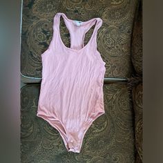 Pink Fashion Nova Tank Bodysuit Never Worn Casual Scoop Neck Bodysuit With Lined Body, Chic Sleeveless Summer Leotard, Summer Bodysuit For Loungewear, Summer Cotton Stretch Bodysuit, Stretch Cotton Summer Bodysuit, Pink Bodysuit For Summer Loungewear, Pink Summer Bodysuit For Loungewear, Summer Stretch Bodysuit With Scoop Neck, Casual Sleeveless Leotard