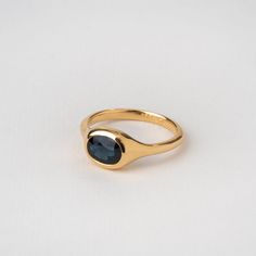 A precious central sapphire in an oval structure ✦ Material ✦ 18k yellow solid gold ✦ Details ✦ Stone: natural (untreated) blue sapphire 1.9 ct Shape: oval faceted or cabochon stone (you can choose) Bezel width: 8 mm Band width: 2.3 mm - Please note Each gemstone can look a little different, there is a range of tones for natural stones. Slight changes in shape and color may occur. All of our items are meticulously made in our studio in HaYogev. Manufacturing time takes 10-20 days. Ring Size This Gold Ring With Colored Stones, Gold Ring Blue Stone, Oval Sapphire Signet Ring Hallmarked, Oval Yellow Gold Sapphire Ring With Bezel Setting, Oval Sapphire Ring In Yellow Gold With Bezel Setting, Oval Sapphire Signet Ring In 14k Gold, Gold Oval Cabochon Sapphire Ring Fine Jewelry, Gold Sapphire Ring With Oval Cabochon, Oval Sapphire Ring With Polished Finish In 14k Gold