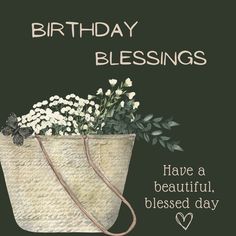 a happy birthday card with flowers in a basket