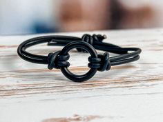 Stacking Boho Leather Bracelet | Create Your Perfect Bracelet! | Handmade To Order A S E N A T H ∙ D E S I G N S ・H A N D M A D E  W I T H  L O V E  This fun and easy to wear adjustable cord bracelet is the perfect accessory. I start with 2mm  genuine leather cord and a petite 3/4" ring. I use a unique double twisted knot to attach the cord to the ring and add an adjustable knot to the back. I love to wear this bracelet by itself for a simple, classic look or stack it with one of my cuff or cord Bracelet With Ring, Karma Bracelet, Leather Cord Bracelets, Kraft Bag, Adjustable Knot, Circle Bracelet, Boho Leather, Round Leather, Cord Bracelet