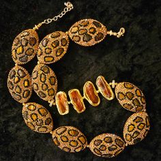 This is stunning!  Ten gold and black rhinestone pave beads with inlaid tiger's eye are featured in this rich, elegant and posh statement necklace which will easily go from the boardroom to a dinner venue.  Adjusts from 20-22" with gold tone hardware and a tiny lobster claw clasp.  Four copper biwa freshwater pearls with gold plated trim are asymmetrically placed for additional interest and drama.  If you wish, I may be able to get more of these beads and customize earrings for you.  You will lo Luxury Statement Gold Beads, Biwa Pearl Necklace, Jewellery Shop Design, Turquoise Western, Biwa Pearls, Pave Beads, Western Jewelry, Custom Earrings, Freshwater Pearl Necklaces