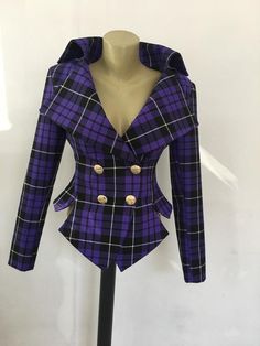 This is a very stylish and elegant jacket . Leght  58cm - at back. Fully lined. A jacket especially made to turn heads and give you that wow factor :)SIZE CHARTSIZE S - US 6, UK 8, EU 36bust: bust around 34.5”/90cmWaist: waist around 27.5”/70cmHips: hips around 34.5”/90cmSIZE M - US 8, UK 10, EU 38bust: bust around 37.5”/95cmWaist: waist around 29.5”/75cmHips: hips around 37.5”/95cmSIZE L - US 10, UK 12, EU 40bust: bust around 39.5"/100cmWaist: waist around 31.5”/80cmHips: hips around 39.5”/100c Trendy Fitted Double-breasted Blazer, Fitted Long Sleeve Punk Outerwear, Fitted Long Coat In Punk Style, Fitted Punk Style Long Coat, Double-breasted Fall Party Blazer, Fitted Long Sleeve Blazer For Winter, Trendy Double-breasted Party Outerwear, Trendy Fitted Outerwear With Suit Collar, Fitted Long Sleeve Blazer With Buttons