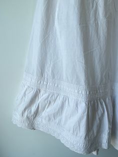 Vintage Victorian White Skirt. Classic crisp white cotton! Doesn't get better than this. In excellent vintage condition, button closure in back. Best fits XS, hand wash cold and line dry. Approximate measurements:Waist: 12" across laying flatLength: 32" White Buttoned Skirt For Daywear, Cotton Skirt For Daywear, Cotton Skirt With Lace Trim For Daywear, White Cotton Bottoms For Daywear, Classic Cotton Skirt With Button Closure, Classic Cotton Skirt For Daywear, White Pleated Skirt For Daywear, Vintage White Bottoms For Daywear, White Buttoned Bottoms For Daywear