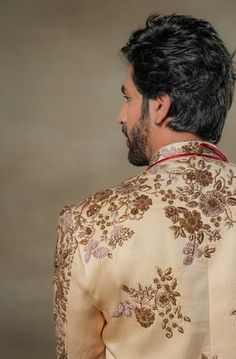 Frosted Almond Sherwani | Jatin Malik Introducing our masterpiece: the golden placement hand-embroidered sherwani. This exquisite sherwani showcases an intricate embroidery technique that utilizes various types of dabka and moti. The meticulous placement of these embellishments creates a stunning visual impact, highlighting the craftsmanship and artistry involved. Perfect for making a grand and elegant statement, this sherwani is a true testament to refined luxury and traditional excellence. Included in purchase: Sherwani, Kurta, Churidar Product Specification Color: Golden Fabric: Linen silk Occasion: Engagement, Wedding, Bridal, Reception Style: Sherwani, Kurta, Churidar Care: Dry Clean Work: Hand Embroidery Customization options:Can be customized in any color or style Note: A stylist wi Luxury Ceremonial Sherwani In Traditional Drape, Luxury Embroidered Sherwani, Luxury Ceremonial Chanderi Sherwani, Luxury Georgette Sherwani With Intricate Embroidery, Luxury Cotton Silk Sherwani With Pallu, Luxury Pink Sherwani With Traditional Drape, Luxury Embellished Elegant Sherwani, Luxury Pink Sherwani For Transitional Season, Jatin Malik