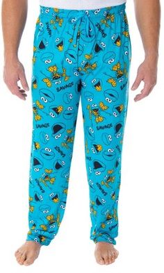 These are OFFICIALLY LICENSED Cookie Monster lounge pants! OM NOM NOM!! Cookie Monster is one of the most popular characters from the classic children's television show Sesame Street! The way he devours those Cookies, though... SAVAGE!! Remind you of anyone in your life? Or are you just a huge Cookie Monster fan? Then this is the pajama pants to buy! These Sesame Street adult lounge pants are extremely high-quality with a new fabric blend style. It is made of a wonderful 92% polyester / 8% spand Cookie Monster Pajamas, Sesame Street Cookie Monster, Recliner Couch, Man Cookies, Allover Design, Comfortable Pajamas, Allover Pattern, Fashion Goals, Lounge Pajamas