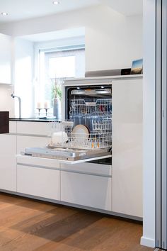 an image of a dishwasher that is open on the appliance page