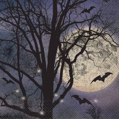 bats flying in front of a full moon with trees and lights on the branches at night