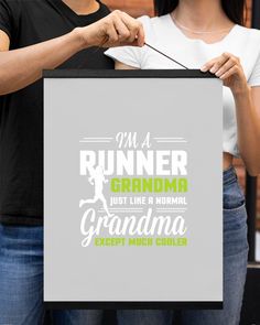 a woman holding up a framed sign that says i'm a runner grandma just like a normal grandma except much cooler