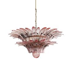 a pink glass chandelier hanging from a chain on a white background with clippings