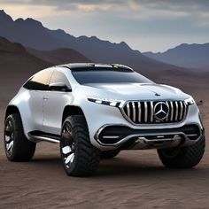 the mercedes benz concept suv is shown in front of mountains