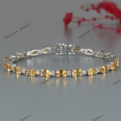 9.15 Cts Natural Citrine Oval Cut Gemstone Tennis Bracelet, 14k Gold Citrine Bracelet, November Birthstone, Handmade Bracelet, Wedding Gift, Anniversary Gift, Gift for Her ✰PRODUCT DETAILS✰ * SKU - BST-390-CT * Product - Bracelet * Metal - Sterling Silver * Metal Purity - 925 * Total Weight - 10.65 GMS (Approx.) ✰ STONE DETAILS ✰ * Stone Name - Citrine  * Stone Shape - Oval * Stone Size - 6x4mm * Stone Color - Yellow * Stone Weight - 9.15 CTS * Stone Cut - Faceted * Birthstone - November ✰Additi Gemstone Tennis Bracelet For Wedding, Wedding Gemstone Tennis Bracelet, Peridot Bracelet, Citrine Bracelet, Citrine Jewelry, Wedding Jewelry Bracelets, Citrine Stone, Birthstone Bracelets, Yellow Stone