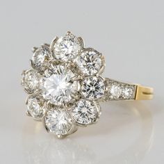 Modern 3, 18 Carats Diamonds 18 Karat Yellow Gold Platinum Daisy Ring Size 7 | Chairish Flower Shaped Engagement Ring, Daisy Rings, Two Tone Engagement Ring, Two Tone Engagement Rings, Antique Engagement Ring, Antique Wedding Rings, Gold Eagle, Flower Engagement Ring, Daisy Ring