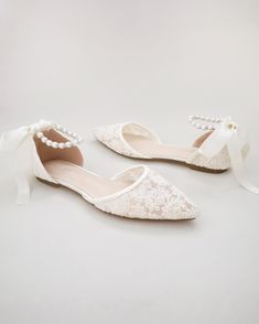 Crochet lace pointy toe flats for comfortable wear throughout your special day and perfect for wedding party. With pearl ankle strap to create a classic yet sophisticated look for any occasion. DETAILS: UPPER: Synthetic upper and lining MATERIALS: Manmade outsole HEEL HEIGHT: 0.3" ORIGIN: Imported Pointy Toe Flats, Bride Shoes, Shoes Collection, Crochet Lace, Womens Flats, On Shoes, Formal Wear, Silver Beads, Shoe Collection