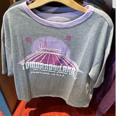 Nwt Disney Parks Tomorrowland See Tomorrows Future Today T Shirt Pink Cotton Tops For Disney Trips, Relaxed Fit Short Sleeve Tops For Disney Fan Events, Casual Tops With Character Print For Theme Park, Letter Print Short Sleeve Tops For Disney Trips, Casual Crew Neck Tops For Theme Park, Disney Crew Neck Top With Relaxed Fit, Pink Disney T-shirt With Letter Print For Fan Events, Crew Neck Cotton Tops For Theme Park, Casual Graphic Print Tops For Theme Park