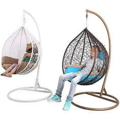 a man sitting in a hanging egg chair