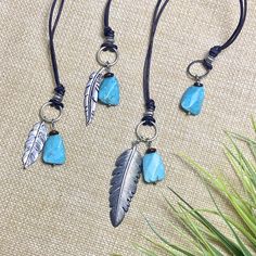 The silver feather necklace is a stunning piece of boho style jewelry, featuring an authentic Native American design with a turquoise Howlite stone and your choice of silver-plated feather. This optional, custom engraved charm pendant makes a meaningful gift, blending cultural heritage with personalized elegance. 🪶 𝗠𝗔𝗧𝗘𝗥𝗜𝗔𝗟𝗦 + 𝗗𝗜𝗠𝗘𝗡𝗦𝗜𝗢𝗡𝗦 ❯  Blue Howlite, Silver-plated Feather, Wood Bead, Leather Cording ❯  15mm Engraved Stainless Steel Charm (optional) 🪶 𝗡𝗘𝗖𝗞𝗟𝗔𝗖𝗘 𝗦𝗧𝗬𝗟𝗘-- select from the following styles (see photo 5 for all) ❯  A (photo 7) ❯  B (photo 6) ❯  C (photo 3) ❯  D (photo 8) 🪶 𝗦𝗧𝗢𝗡𝗘 + 𝗘𝗟𝗘𝗠𝗘𝗡𝗧 𝗘𝗡𝗘𝗥𝗚𝗬 ❯  TURQUOISE (color) is known to align the chakras and provides inner peace ❯  WOOD symbolizes life, growth and strength 🪶 𝗬𝗢𝗨 Adjustable Feather Necklace As Gift, Bohemian Turquoise Charm Necklaces, Bohemian Turquoise Charm Necklace, Adjustable Bohemian Necklaces With Feathers, Bohemian Turquoise Pendant Charm Necklaces, Bohemian Turquoise Charm Necklaces For Gifts, Bohemian Turquoise Charm Necklace For Gift, Adjustable Turquoise Bohemian Charm Necklace, Bohemian Feather Jewelry Gift