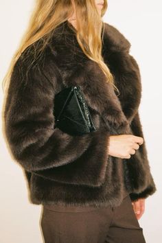 This is an oversized faux fur jacket with notched lapels and side pockets. Wear over any of our occasion dresses to complete your look. Brown Leather Sherpa Jacket, Luxury Brown Suede Leather Jacket, Brown Leather Jacket With Faux Fur Trim, Luxury Brown Shearling Leather Jacket, Luxury Brown Faux Fur Leather Jacket, Faux Fur Jacket, Fur Jacket, Occasion Dresses, Faux Fur