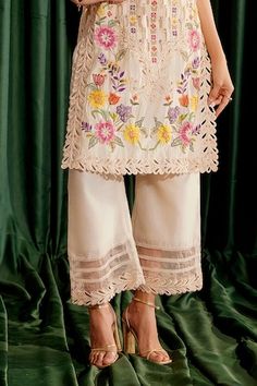 Ivory chanderi kurta with floral pearls, beads, thread and cutwork embroidery. Paired with coordinating cutwork embroidered pant. - Aza Fashions Cutwork Embroidery, Embroidered Pants, Kurta With Pants, Cut Work, Flared Sleeves, Floral Embroidery, Aza Fashion, Pants For Women, Embroidery