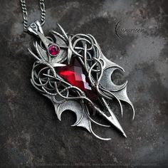 NYRNHYR - Exclusive gothic, vampire, fantasy style necklace. Fully handmade work (wire wrapping technique with oxidizing and polished silver). Main base gem: Red Quartz 11,5 Ct (2,3g). Additional stones: Cubic Zirconia. Material: silver (Sterling Silver, Fine Silver / 925, 999). We use only high-quality silver. Our silver does not contain harmful nickel.  Chain length: 42 cm + 7 cm, Figaro, with a decorative clasp, adjustable. Pendant length: 6,2 cm, width: 3,5 cm. Pendant weight: approx 20g. Co Gothic Red Necklace For Cosplay, Red Gothic Necklace For Cosplay, Handmade Vampire Jewelry For Cosplay, Handmade Vampire Style Jewelry For Cosplay, Red Fantasy Jewelry For Cosplay, Gothic Wire Wrapped Pendant Jewelry, Artifact Art, Wire Wrapping Techniques, Fantasy Style