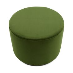 a green round ottoman sitting on top of a white floor