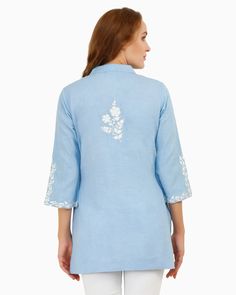 As you slip into the Celestial Tunic, you'll feel like you're being wrapped in a luxurious, celestial embrace. This blue cotton and linen tunic is not just a piece of clothing, it's a statement of style. The embroidery on the Celestial Tunic is exquisite, showcasing the intricate detailing that has been weaved into the design. The tunic top for women is made from premium quality cotton and linen, providing a comfortable and breathable fit for any occasion. Whether you're heading out for a casual Hippie Cardigan, Collarless Shirt, Button Shirts, Unisex Clothes, Clothes Casual, Linen Tunic, Summer Linen, Thread Embroidery, Top For Women