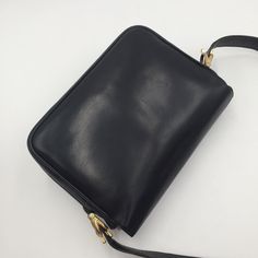 "100% Authentic Celine Vintage Black Shoulder Bag - Material: Leather - Hardware: Gold hardware, signs of use - Color: Black - Genuine leather shoulder strap - Signed: \"CELINE PARIS\" - Serial number reads: MADE IN ITALY - Inside: BC, some signs of use - Outside: B, Some signs of used - Size approx.: L24 H19 D6 cm - Shoulder strap drop max 40 cm - Come with: Nothing - Condition: B Description of Grade N : New S : Unused SA : Less frequently used items A : There is a little feeling, good conditi Modern Black Shoulder Bag With Brass Hardware, Classic Evening Shoulder Bag With Brass Hardware, Black Shoulder Bag With Brass Hardware For Work, Designer Business Shoulder Bag With Brass Hardware, Black Business Bags With Brass Hardware, Black Rectangular Bag With Brass Hardware, Formal Black Satchel With Brass Hardware, Celine Vintage, Celine Paris