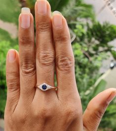 * Product Details : * Diamond Details : * Diamond Type : Natural Diamond * Diamond Color : G/H * Diamond Clarity : SI * Diamond Shape : Round Cut * No Of Pcs : 24 * Sapphire Information * Minimum Number of Round Sapphires: 05 * Total Carat Weight : 0.15 Ct - Please select your Ring size & Gold Colour & Purity at the drop down menu. - This Ring Design Is Available With Any Gemstone/Birthstone If The Gemstone That You Want Is Not Available Contact Me & I will Have That For You. - Pleas Diamond White Sapphire Ring With Halo Setting As Gift, Sapphire Birthstone Ring With Diamond For Wedding, Sapphire Diamond Birthstone Ring For Wedding, Sapphire Halo Design Rings For Anniversary, Wedding Sapphire Crystal Ring With Prong Setting, Sapphire Halo Anniversary Rings, Sapphire Round Band Wedding Ring, Sapphire Round Cut Wedding Ring, Sapphire Wedding Ring With Round Band As Gift