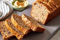 sliced loaf of banana bread on a cutting board