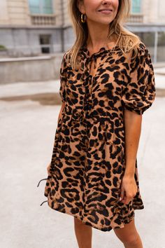 Mini leopard print dress that features bows to tie on the front, has a super soft touch as well as a flowy fit. This dress offers a crewneck and does not offer lining but is not sheer. The perfect fun, animal print wardrobe addition for any occasion. Sizes: S-M / M-L S-M: Length 31.50 in - Width 18.11 in M-L: Length 31.89 in - Width 19.29 in 65% Polyester - 35% Cotton Washing: handwash Animal Dress, Parisian Women, Leopard Print Dress, Spring Summer Fashion, Bow Tie, Print Dress, Leopard Print, Animal Print, Summer Fashion