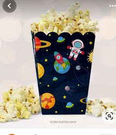 an image of a popcorn box with space theme