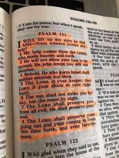 an open bible with the word jesus written on it