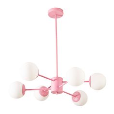 a pink chandelier with five white balls hanging from it's center point