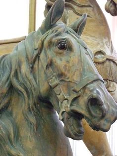 a close up of a statue of a horse