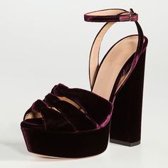 Elevate your style with these luxurious burgundy velvet platform sandals. Featuring a trendy peep toe, chic knotted design, and chunky heels, these shoes are perfect for making a bold fashion statement. Color: Burgundy Material: Velvet Heel Type: Chunky heel Heel height: 6.7" / 170 mm approx Product measurements were taken using size 8. Please note that measurements may vary by size. Toe: Peep toe Tri-strap knotted embellishments Adjustable ankle strap design Handcrafted US sizing. Fits true to size. Luxury Open Toe Heels With Chunky Platform, Luxury Open Toe Chunky Platform Heels, Burgundy Open Toe Sandals For Evening, Velvet Heels For Evening, Velvet Evening Heels, Burgundy Round Toe Sandals For Party, Burgundy Closed Toe Platform Heels, Velvet High Heel Party Shoes, Party Velvet High Heel Shoes