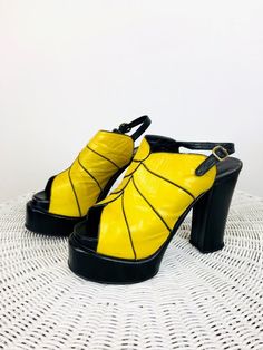 "Vintage 1970s Yellow & Black Platforms - super rare! - 30s style - yellow & black leather - open peep toe - ankle straps - sky high heel - double platform, also at inner sole - by esprit, not the 80s esprit Great vintage condition, minimal wear size 7 5 \"T heel 2.25\"T at front 3.25\"W All sales are final / as-is. We do not accept returns." Retro Black Sandals For Party, Retro Black Party Sandals, Vintage Yellow Heels With Round Toe, Yellow Open Toe Evening Heels, Yellow Open Toe Heels For Evening, Yellow Fitted Sandals For Evening, Fitted Yellow Sandals For Evening, Retro Leather Evening Sandals, Retro Fitted Open Toe Heels