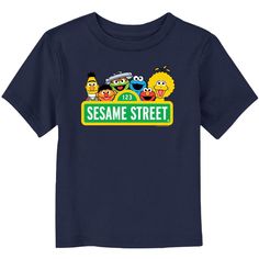 We can tell you how to get to Sesame Street and look good doing it, with these adorable designs for the whole family from the iconic, long-running children's series Sesame Street! Step onto Sesame Street with this officially licensed Toddlers' Sign Classic Group Portrait Graphic T-Shirt featuring Ernie, Bert, Oscar the Grouch, Cookie Monster, Elmo, and Big Bird behind the iconic Sesame Street sign. Bring joy and laughter to your kids' day with this new Sesame Street apparel! Funny Blue Tops For Playtime, Funny Blue T-shirt With Character Print, Blue Short Sleeve T-shirt For Daycare, Sesame Street Sign, Sesame Street Signs, Street Apparel, Portrait Graphic, Group Portrait, Trending Graphic Tees