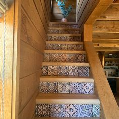 a set of stairs leading up to a kitchen