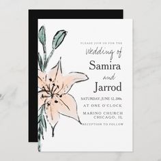 an elegant wedding card with watercolor flowers on the front and black border around it