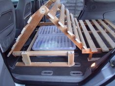 the back end of a car with two trays on it