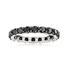 black diamond stack ring in sterling silver with white diamonds on the sides and an oval design