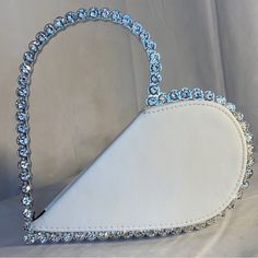 This Heart Clutch Went Viral Last Year Comes With Dustbag, Never Used But Is So Adorable! I Only Have White Version But Wanted To Show How Cute It Is Holding It! Comes With 3 Extra Replacement Rhinestones As Well. Perfect Pristine Condition! White Heart-shaped Shoulder Bag For Valentine's Day, Heart-shaped Evening Shoulder Bag For Valentine's Day, Elegant Heart-shaped Bag With Zipper Closure, Valentine's Day Heart-shaped Bag With Removable Pouch, Heart Clutch, Pink Heart-shaped Bag With Zipper Closure, Valentines Day Hearts, Bags Designer Fashion, Dust Bag