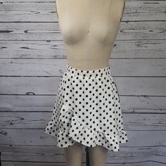 Polka Dot Faux Wrap Skirt Women's Size Small Tie At Waist Can Be Tied In A Bow In Front Or Back. Elastic Pull On Waistband Bottom Hem Ruffle Chic Polka Dot Skirt For Spring, Spring Chic Polka Dot Skirt, Polka Dot Lined Skirt Bottoms For Spring, Casual Polka Dot Ruffled Skirt, Casual Ruffled Polka Dot Skirt, Trendy Polka Dot Skirt For Spring, Fitted Polka Dot Mini Skirt, Chic Polka Dot Ruffled Skirt, Fitted Polka Dot Mini Skirt For Spring