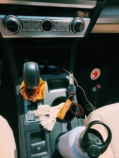 the interior of a car with steering wheel controls and other items on the dash board