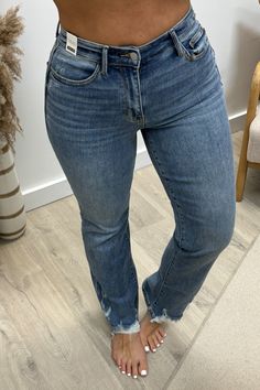 With a high waist and heavy distressing, our Calista Straight Leg Jeans make a statement while keeping you comfortable. These jeans provide both style and comfort, perfect for casual wear. With a unique and playful design, these jeans will become a favorite in your wardrobe. 91% Cotton, 7% Polyester, 2% Rayon Front Ris High Rise Straight Leg Jeans, Mini Shirt Dress, Playful Design, Long Tops, Short Tops, T Shirt Dress, Fashion Boutique, Straight Leg Jeans, Leg Jeans