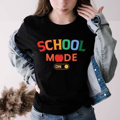 School Mode On T-Shirt, Teachers Tee Gift, School Lover Tee Gift, Funny School Mode On Tee, Hello School Shirt, Funny Student Tee Gift, Back To School T-Shirt We use only high quality vinyl material for print. Please be advised before your order. Thanks! 1️⃣ Select T-Shirt size from Drop Down menu. 2️⃣ Select your T-Shirt color from Drop Down menu. 3️⃣ Choose your quantity as much as you want. 4️⃣ Click ADD TO CART. And, you can go back to add more shirts for your family members or friends or yo Trendy School T-shirt With Crew Neck, Fun Slogan T-shirt For School, Trendy School T-shirt With Funny Print, Trendy Funny Print T-shirt For School, Trendy School T-shirt With Slogan, Casual T-shirt For End Of School Year, School Crew Neck T-shirt With Funny Text, Funny Text Print T-shirt For School, Fun Relaxed Fit T-shirt For School