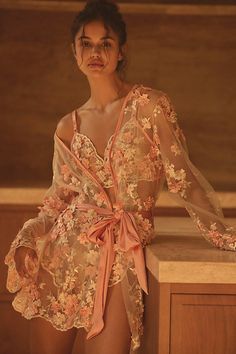 The Kilo Brava Embroidered Short Robe merges comfort and luxury with its intricate embroidery and beading, providing an alluring addition to any loungewear collection. | Embroidered Short Robe by Kilo Brava in Orange, Women's, Size: Largearge, Polyester/Nylon/Elastane at Anthropologie Wedding Night Lingerie, Embroidered Robes, Wedding Robe, Mini Slip Dress, Embroidered Shorts, Bridal Robes, Bridal Lingerie, Loungewear Set, Sleepwear Women